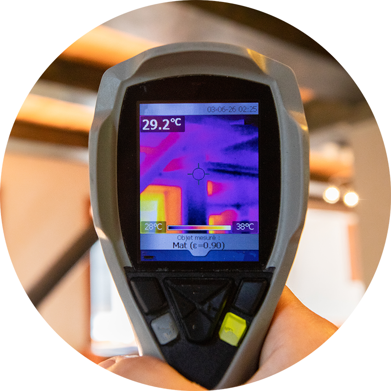 Thermal imaging device being used while preforming environmental inspection services 