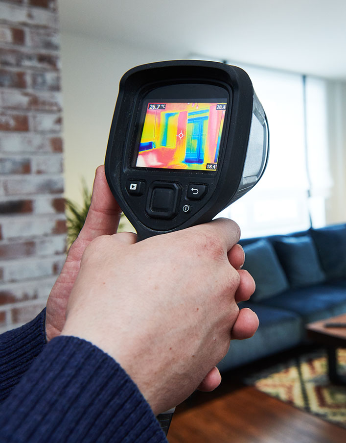 Thermal imaging device being used while preforming environmental testing services 